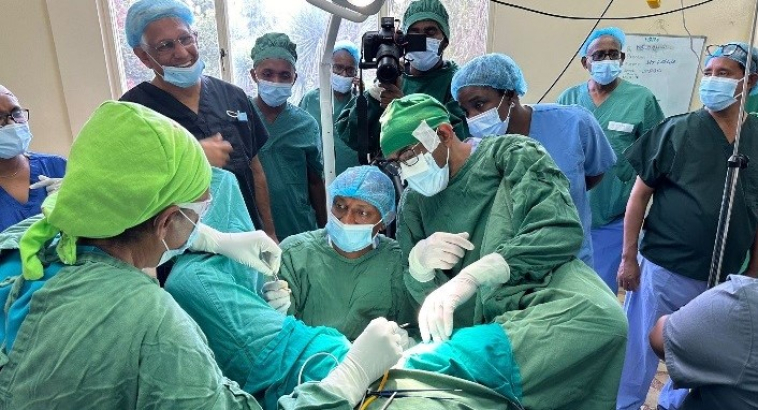 Surgical demonstration, leading surgeon in the middle: Dr Sunday Lengmang – operation to show new one sided tight PV sling  